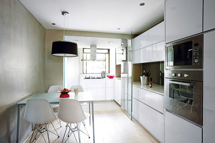 check out this 3-room flat's stunning white and light wood palette